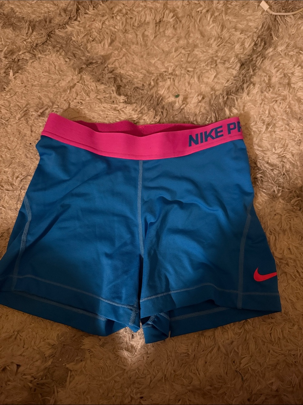 Nike Women's Blue Athletic Shorts with Pink Waistband